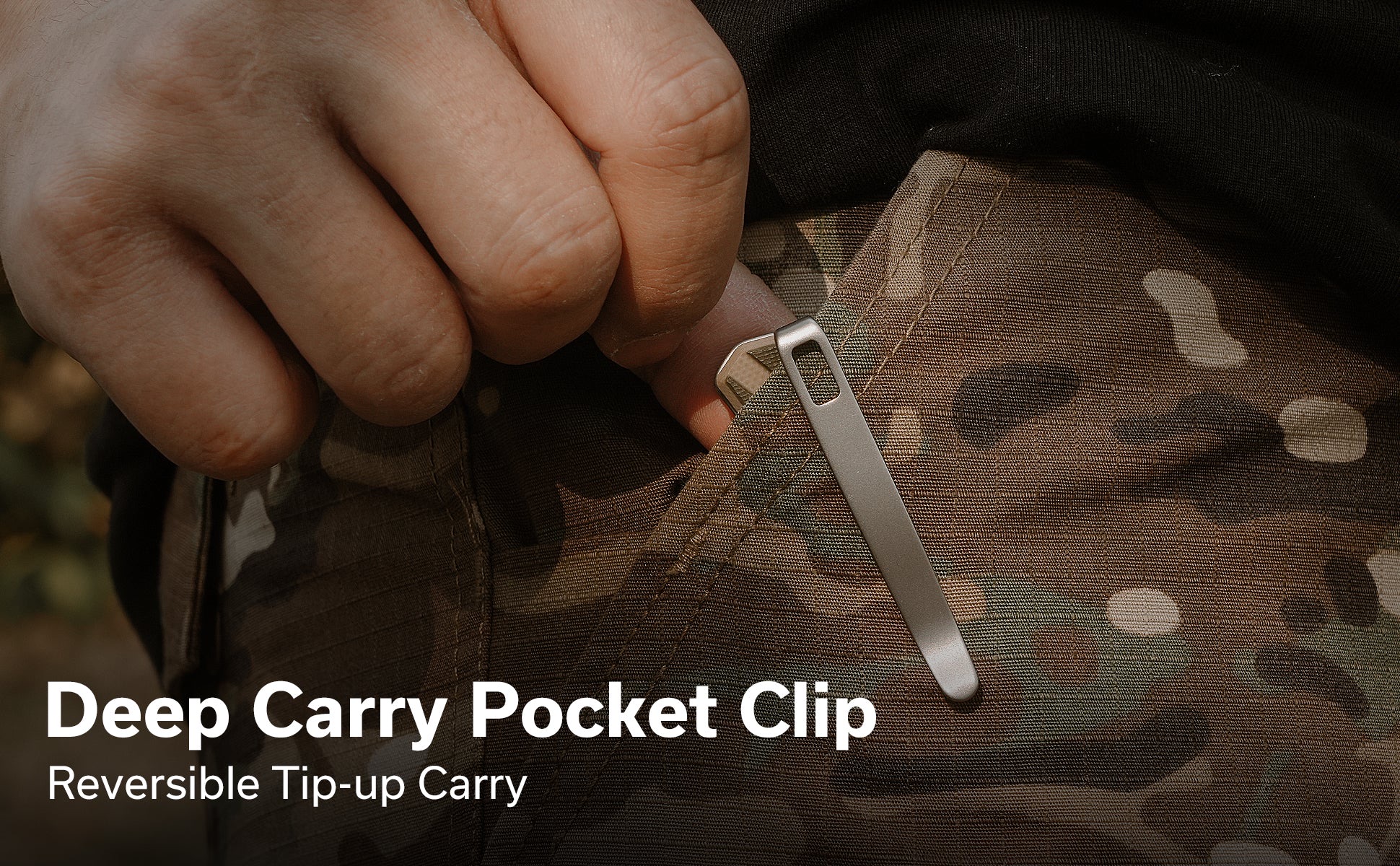 Close-up of a hand pulling a zipper on camouflage fabric, highlighting the deep-carry pocket clip feature.