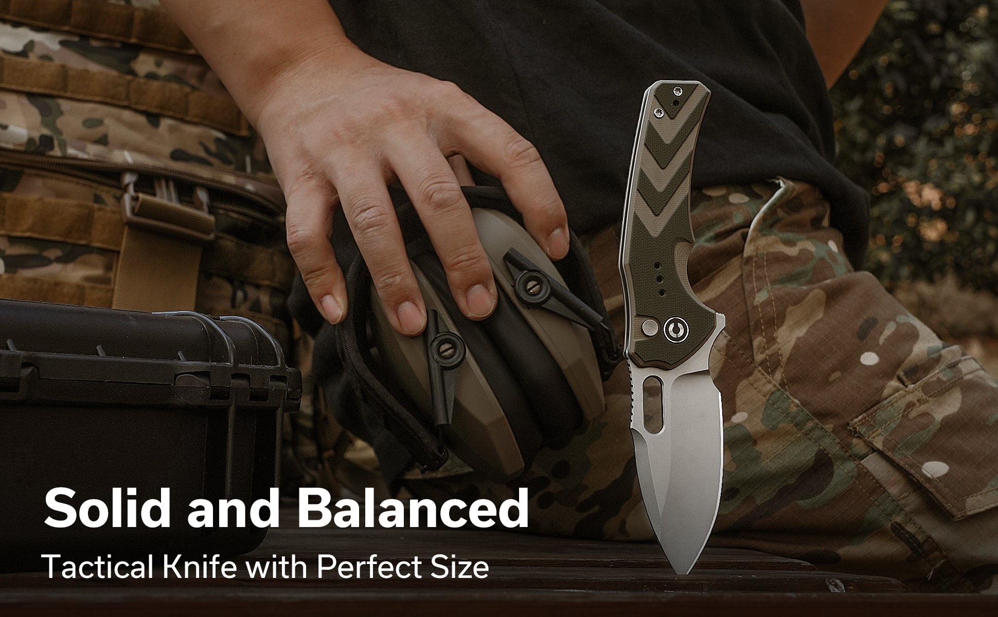 Close-up of a fixed-blade tactical knife with a camo-pattern handle, held by a person in camouflage gear; overlay reads 'Solid and Balanced'.