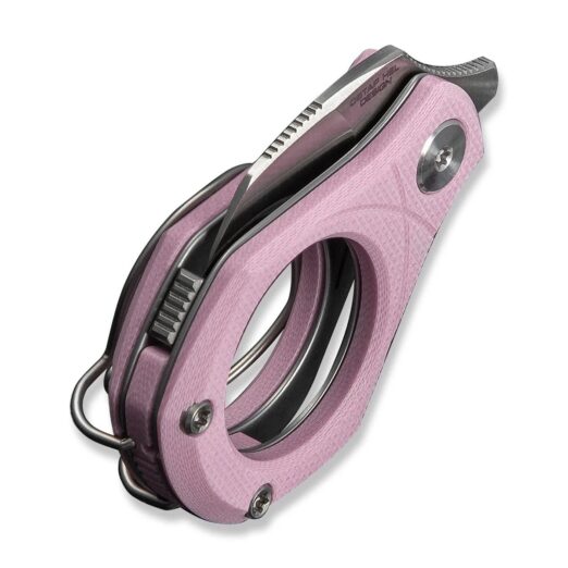 Pink circular safety cutter with a retractable blade and metal locking mechanism.