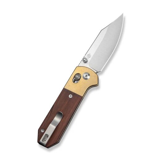 Folding knife with wooden handle, brass bolster, and partially opened stainless blade against a white background.