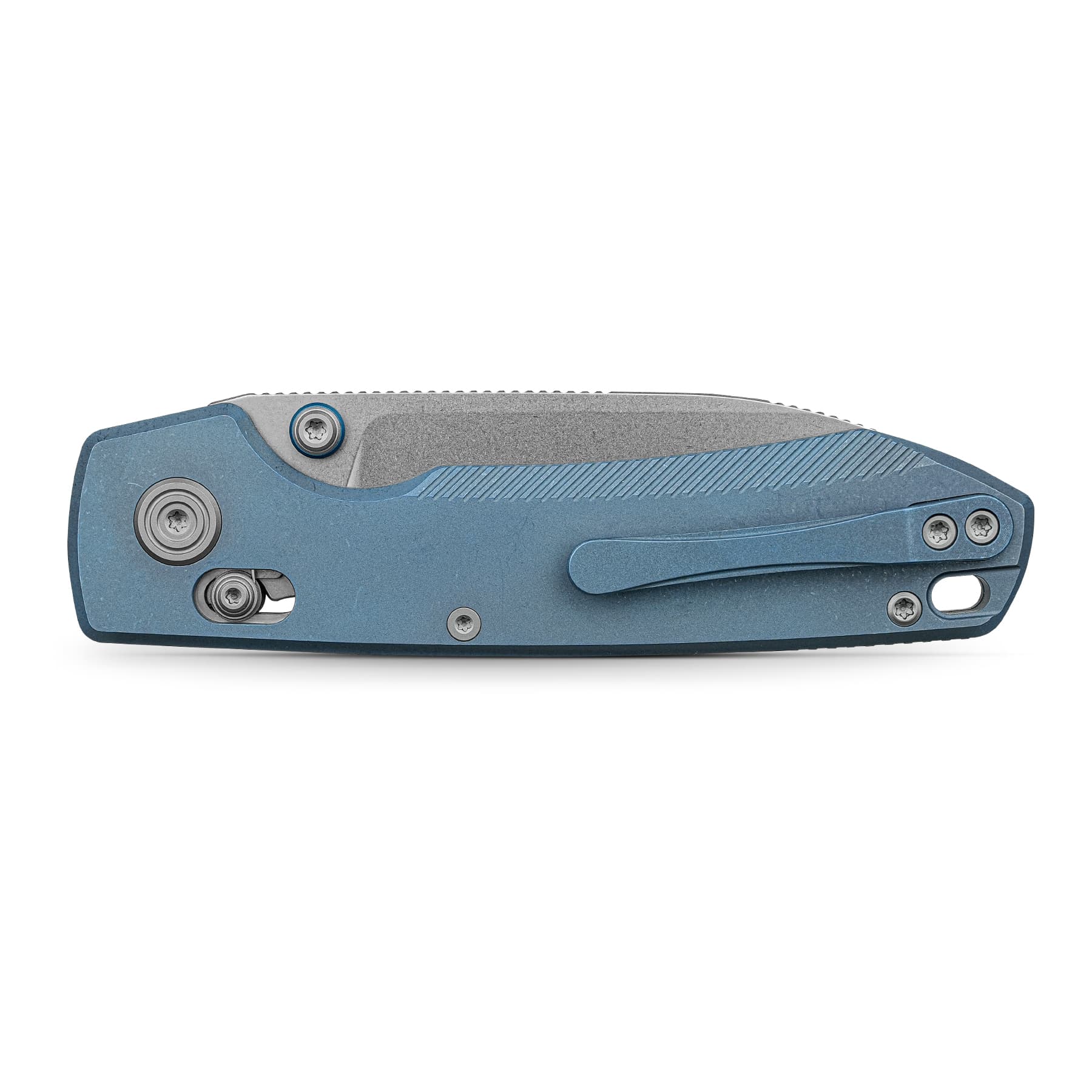 Close-up of blue folding knife handle with screws and a textured grip on a white background.
