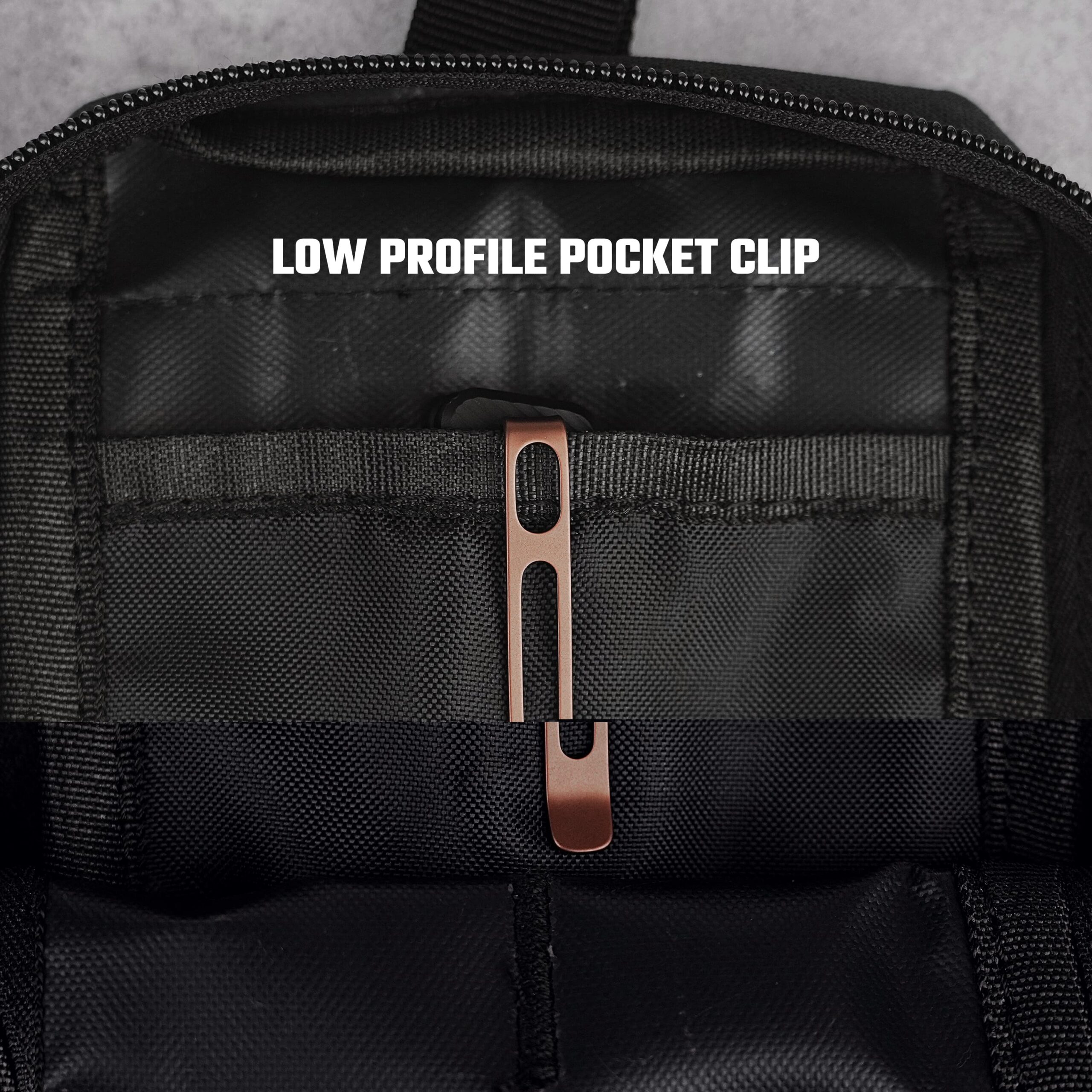 Close-up of a black backpack showing a rugged fabric and a copper zipper pull along the zipper track.