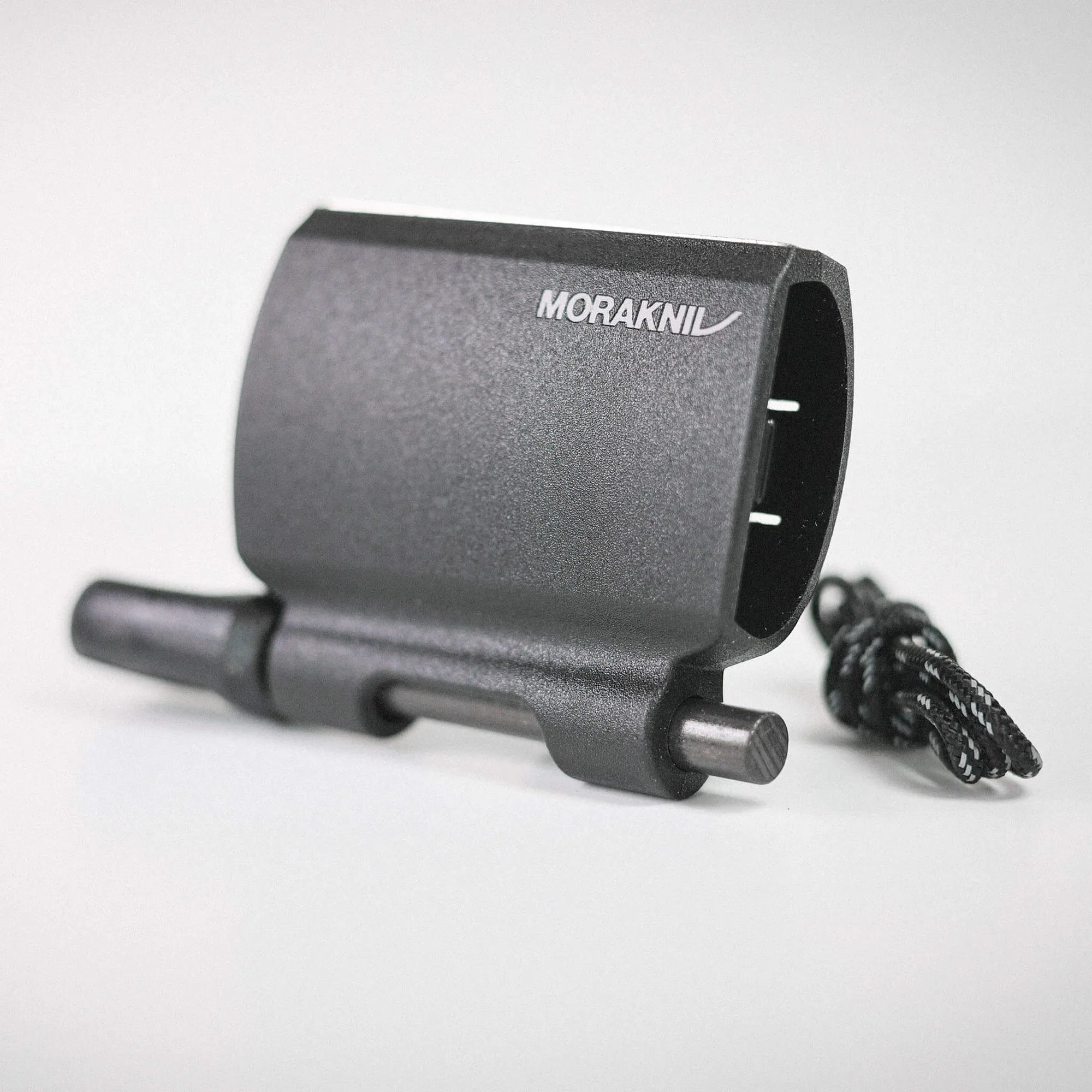 Black Morakniv knife sheath with a textured surface and a braided cord attached, shown from a close-up side angle.
