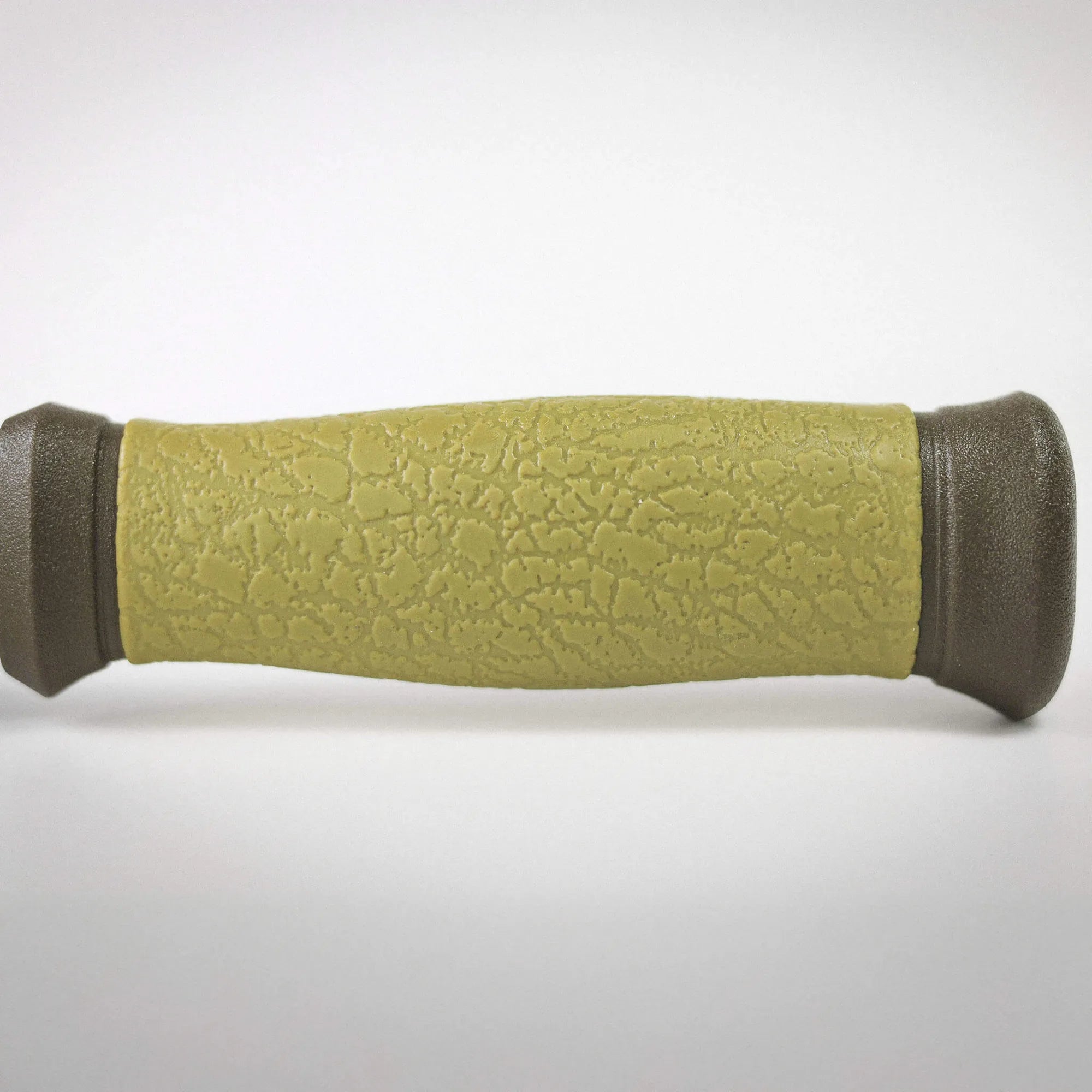 Close-up of a green textured rolling pin with dark handles on a white background.
